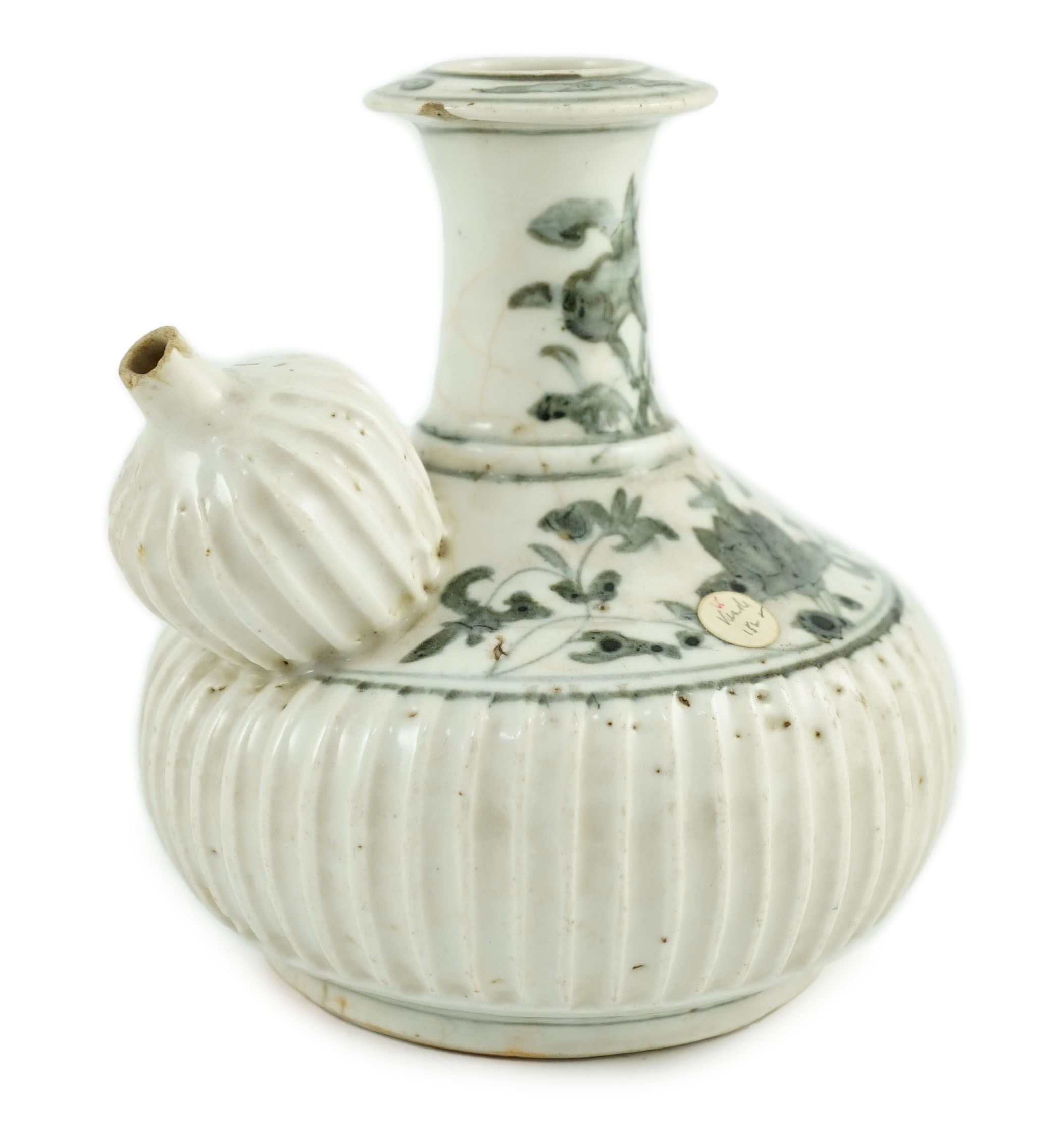A Chinese late Ming blue and white fluted kendi, Zhangzhou kilns, 16cm high, small chips and glaze cracks